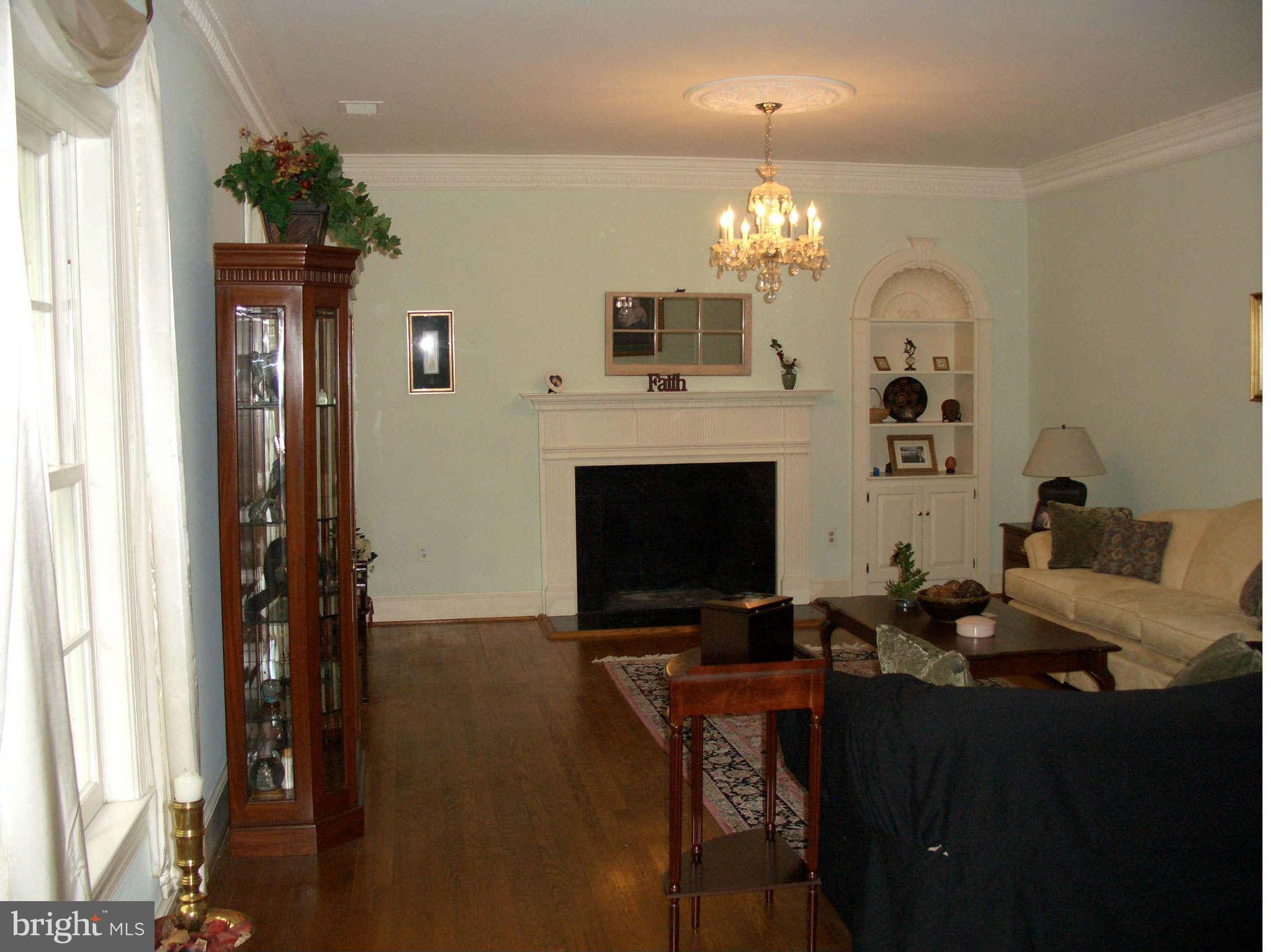 1304 Skipwith Road McLean, VA 22101 - Photo 7 of 25 a view of a dining room with furniture and chandelier