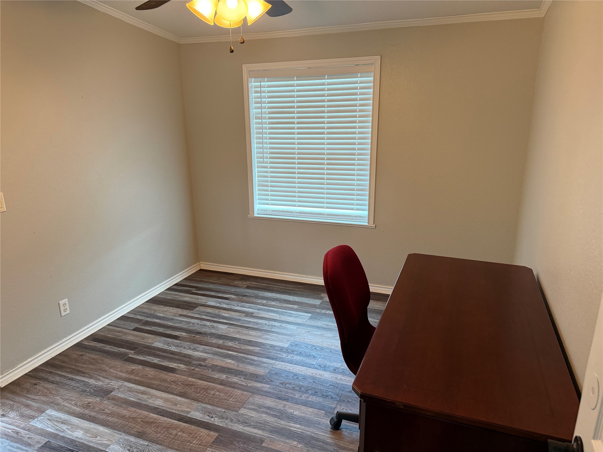 29480 Skymac Ranch Road Hempstead, TX 77445 - Photo 4 of 11 a view of a workspace with furniture and a window