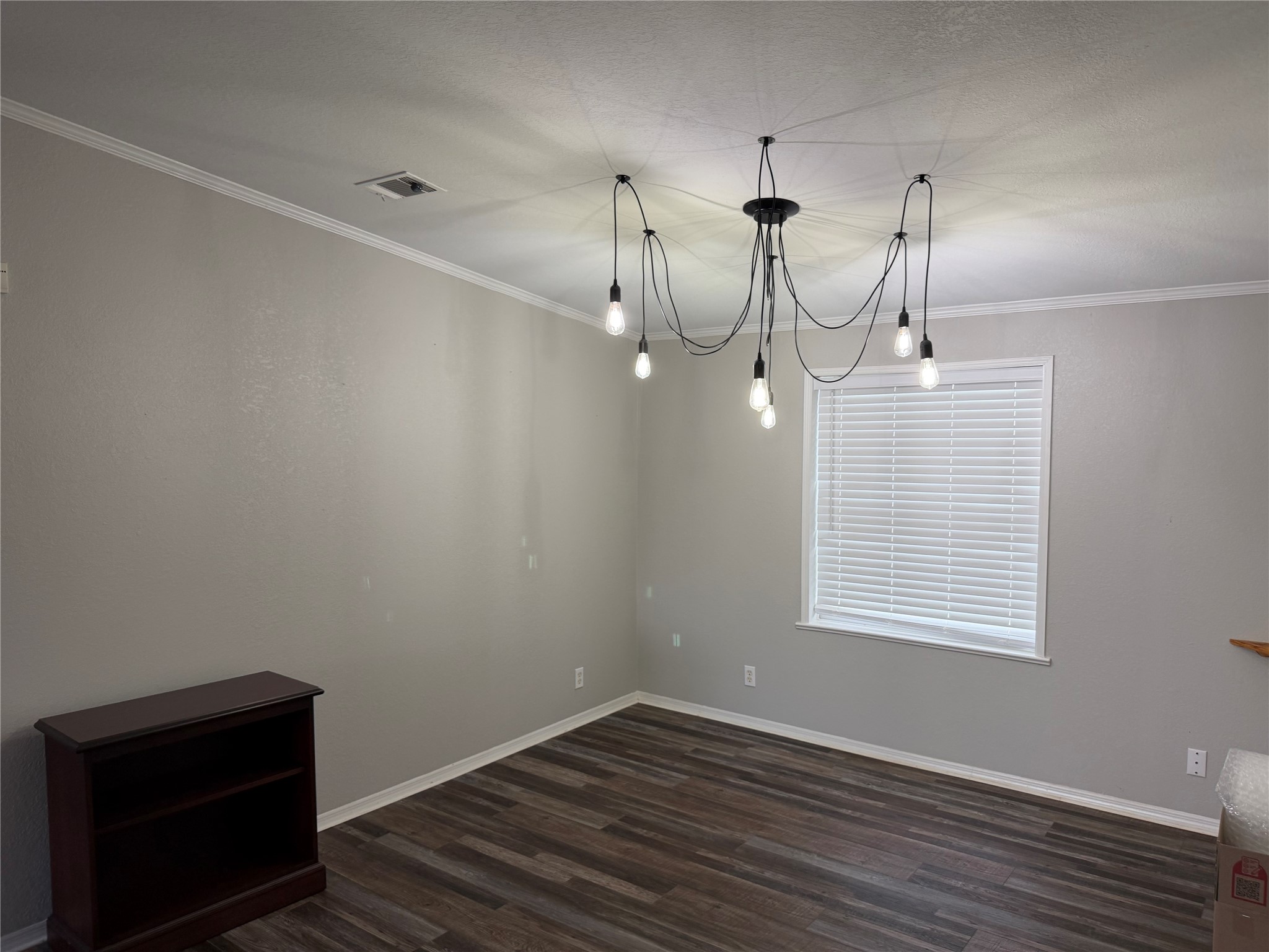 29480 Skymac Ranch Road Hempstead, TX 77445 - Photo 6 of 11 a view of empty room with wooden floor and fan