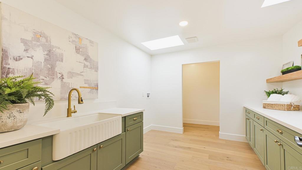 1520 Via Rancho Parkway Escondido, CA 92029 - Photo 74 of 89 a bathroom with a sink and a mirror