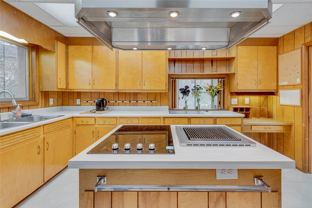 200 Valley View Drive Clemson, SC 29631 - Photo 11 of 31 This spacious kitchen offers ample cabinetry and counter space, perfect for culinary endeavors.
