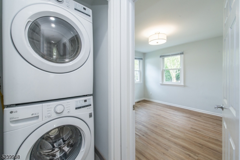 68 Orchard Street, Unit 1 Summit, NJ 07901 - Photo 19 of 23 a view of entryway with washer and dryer