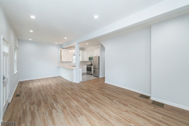 68 Orchard Street, Unit 1 Summit, NJ 07901 - Photo 2 of 23 a view of kitchen with wooden floor