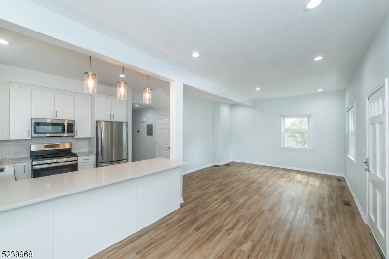 68 Orchard Street, Unit 1 Summit, NJ 07901 - Photo 6 of 23 a view of kitchen with sink and refrigerator