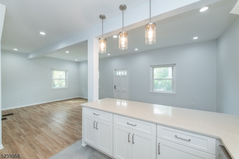 68 Orchard Street, Unit 1 Summit, NJ 07901 - Photo 9 of 23 a bathroom with a sink and a mirror