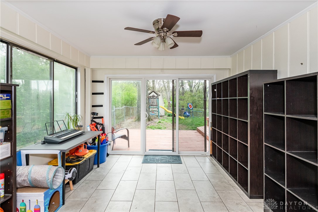 728 Chipplegate Drive Centerville, OH 45459 - Photo 10 of 30 This versatile sunroom offers seamless outdoor access, ideal for relaxation or recreation.