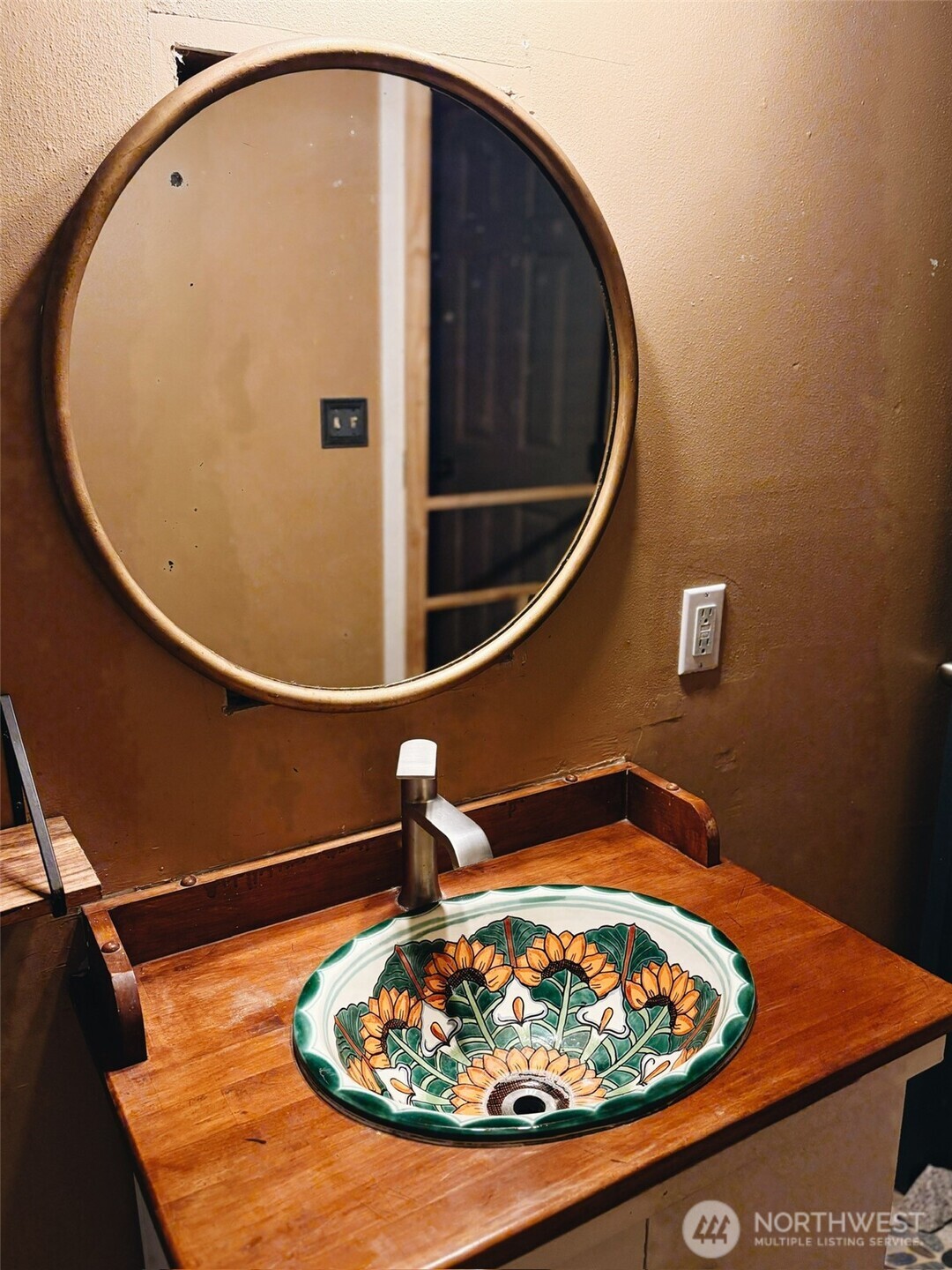 3257 East Harbor Road Langley, WA 98260 - Photo 11 of 20 closeup of a sink with a wooden floor