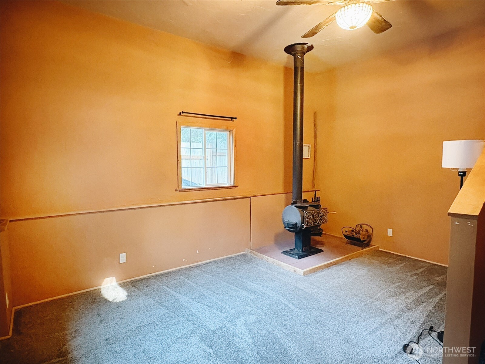 3257 East Harbor Road Langley, WA 98260 - Photo 12 of 20 a view of a room with gym equipment and a window