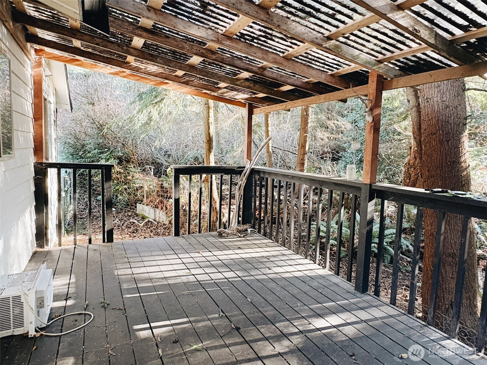 3257 East Harbor Road Langley, WA 98260 - Photo 15 of 20 a view of balcony with wooden floor