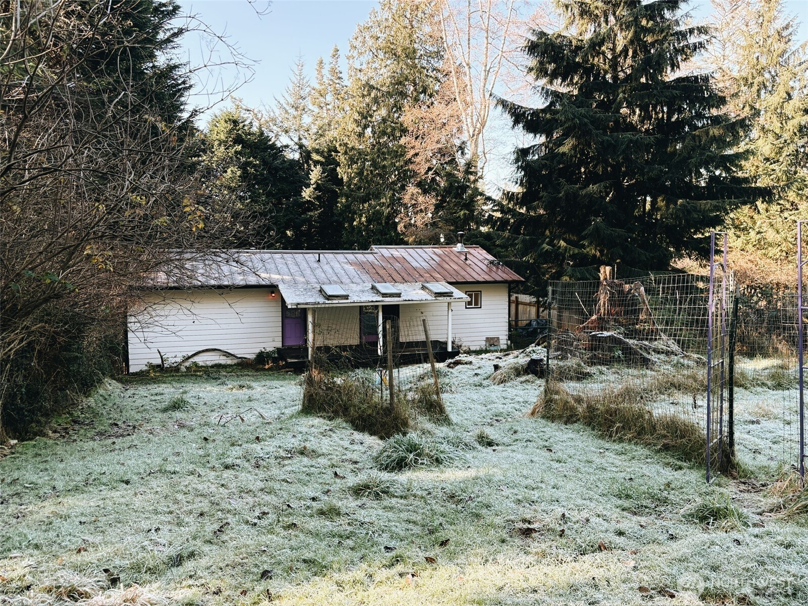 3257 East Harbor Road Langley, WA 98260 - Photo 16 of 20 a view of a house with a sink backyard and sitting area