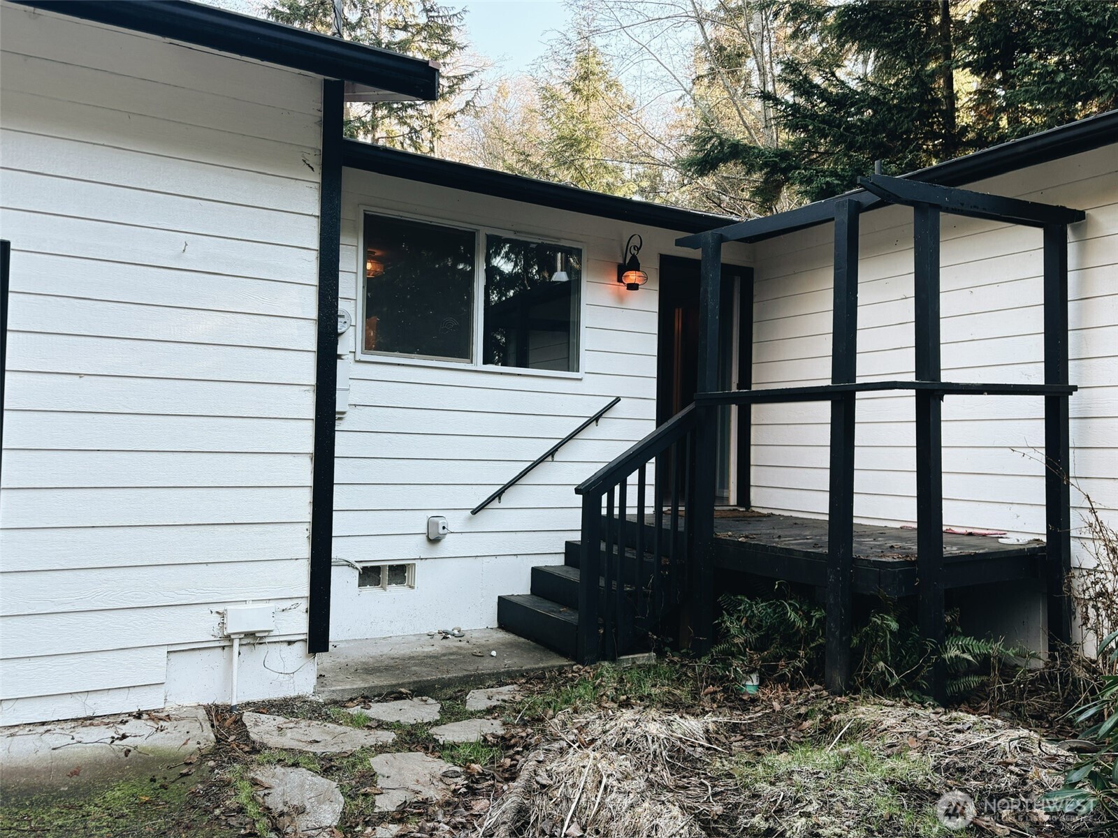 3257 East Harbor Road Langley, WA 98260 - Photo 20 of 20 a view of a house with a patio