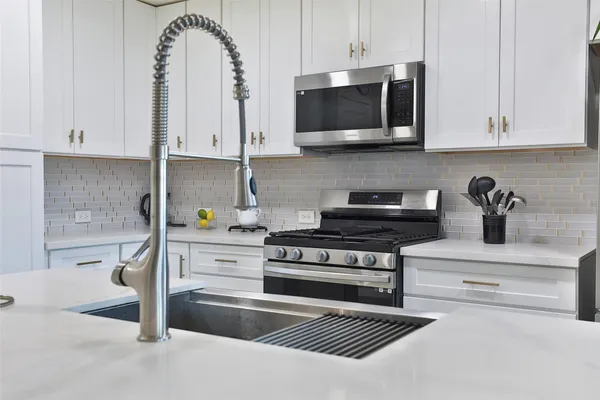 a view of living room with furniture and flat screen tv