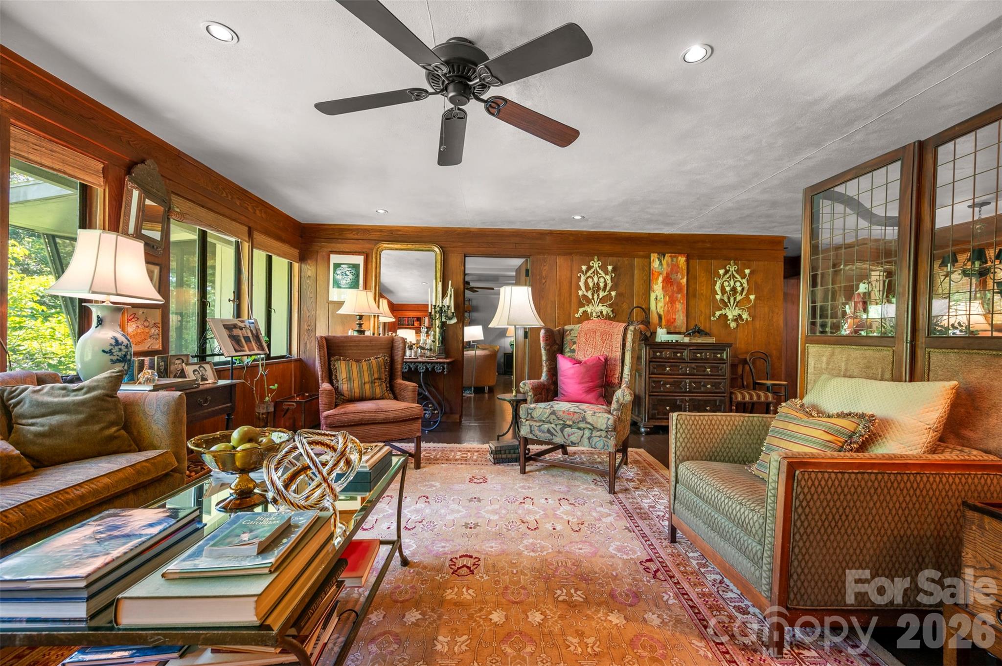 484 Sourwood Ridge Road Tryon, NC 28782 - Photo 12 of 34 a living room with furniture and a large window