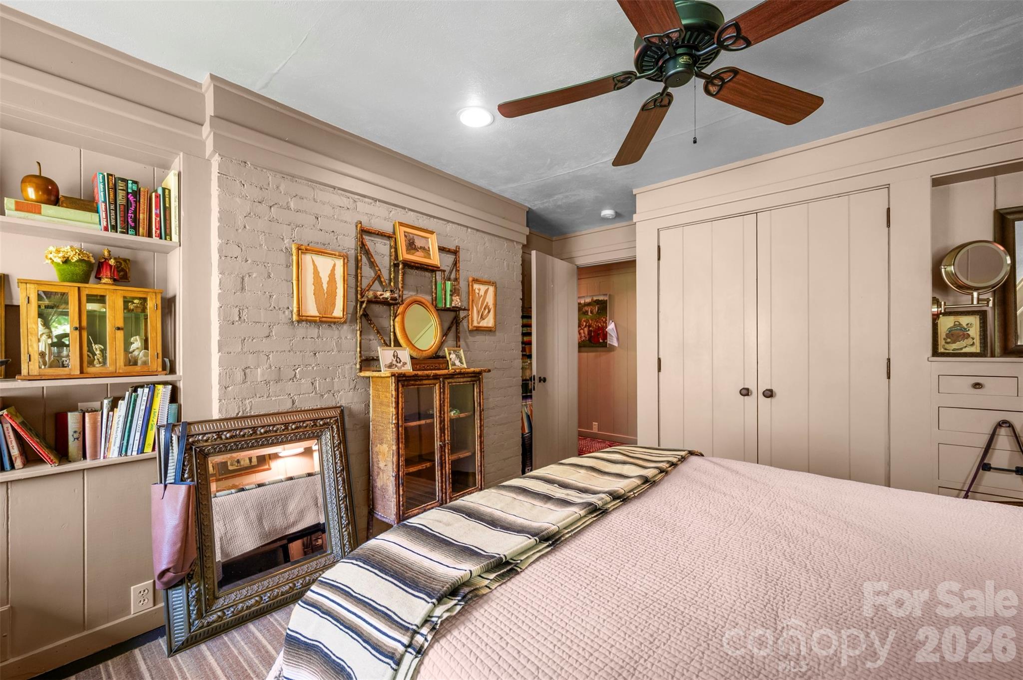 484 Sourwood Ridge Road Tryon, NC 28782 - Photo 16 of 34 a bedroom with a bed dresser and a window