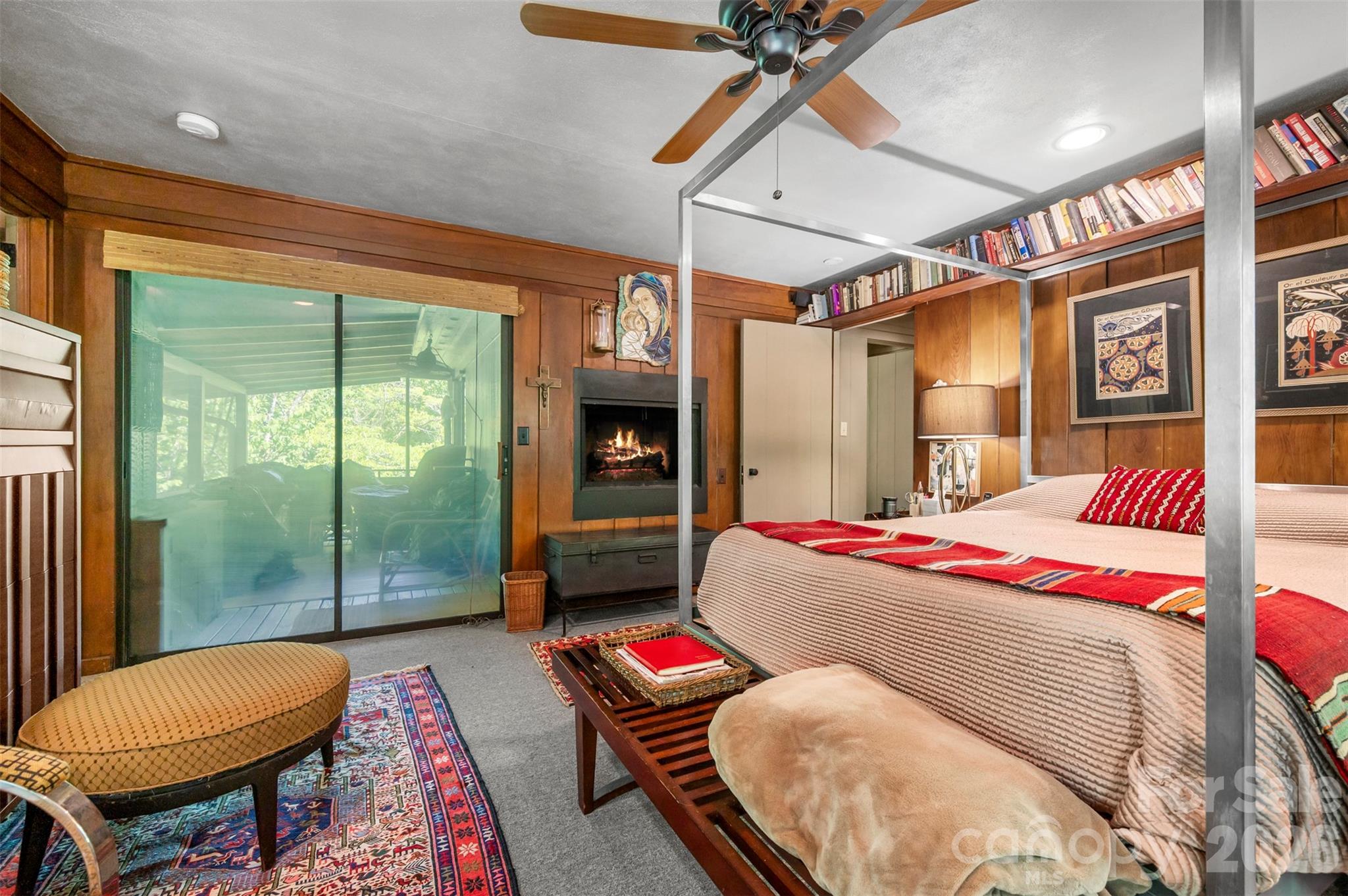 484 Sourwood Ridge Road Tryon, NC 28782 - Photo 19 of 34 a bedroom with a bed and a window