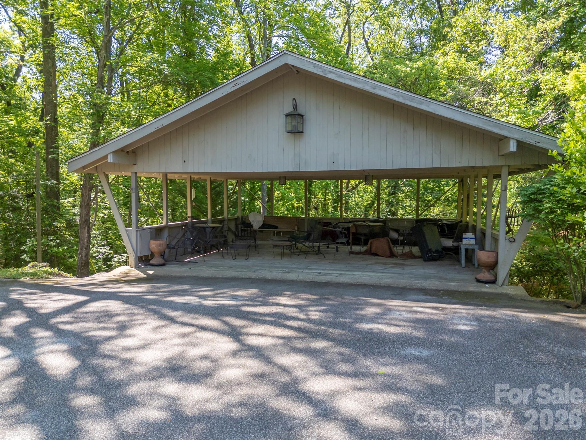 484 Sourwood Ridge Road Tryon, NC 28782 - Photo 29 of 34 a front view of a house with a yard