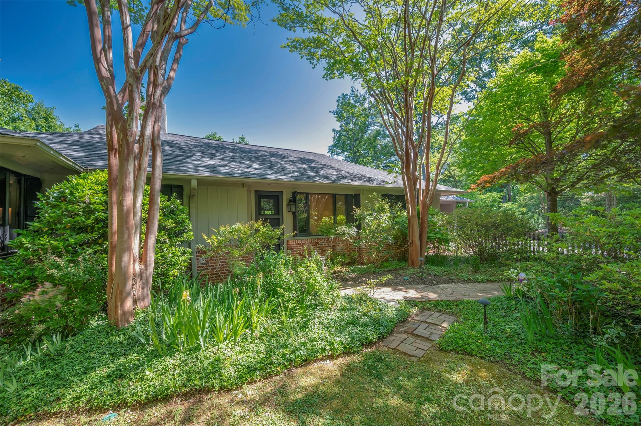 484 Sourwood Ridge Road Tryon, NC 28782 - Photo 31 of 34 a view of a house with a yard