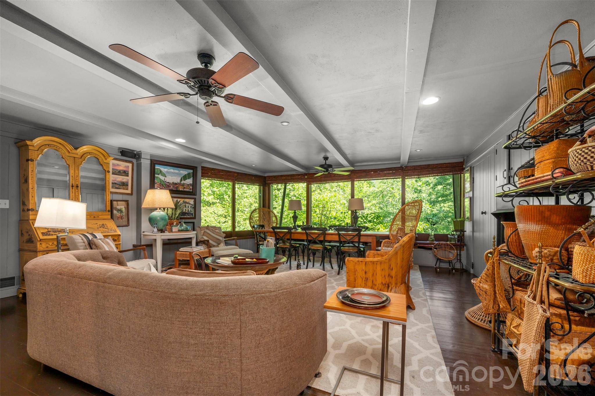 484 Sourwood Ridge Road Tryon, NC 28782 - Photo 4 of 34 a living room with furniture a fireplace and a large window