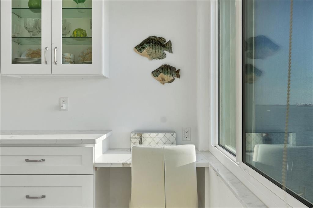 350 Golden Gate Point, Unit 62 Sarasota, FL 34236 - Photo 18 of 40 a bathroom with a bathtub and a sink