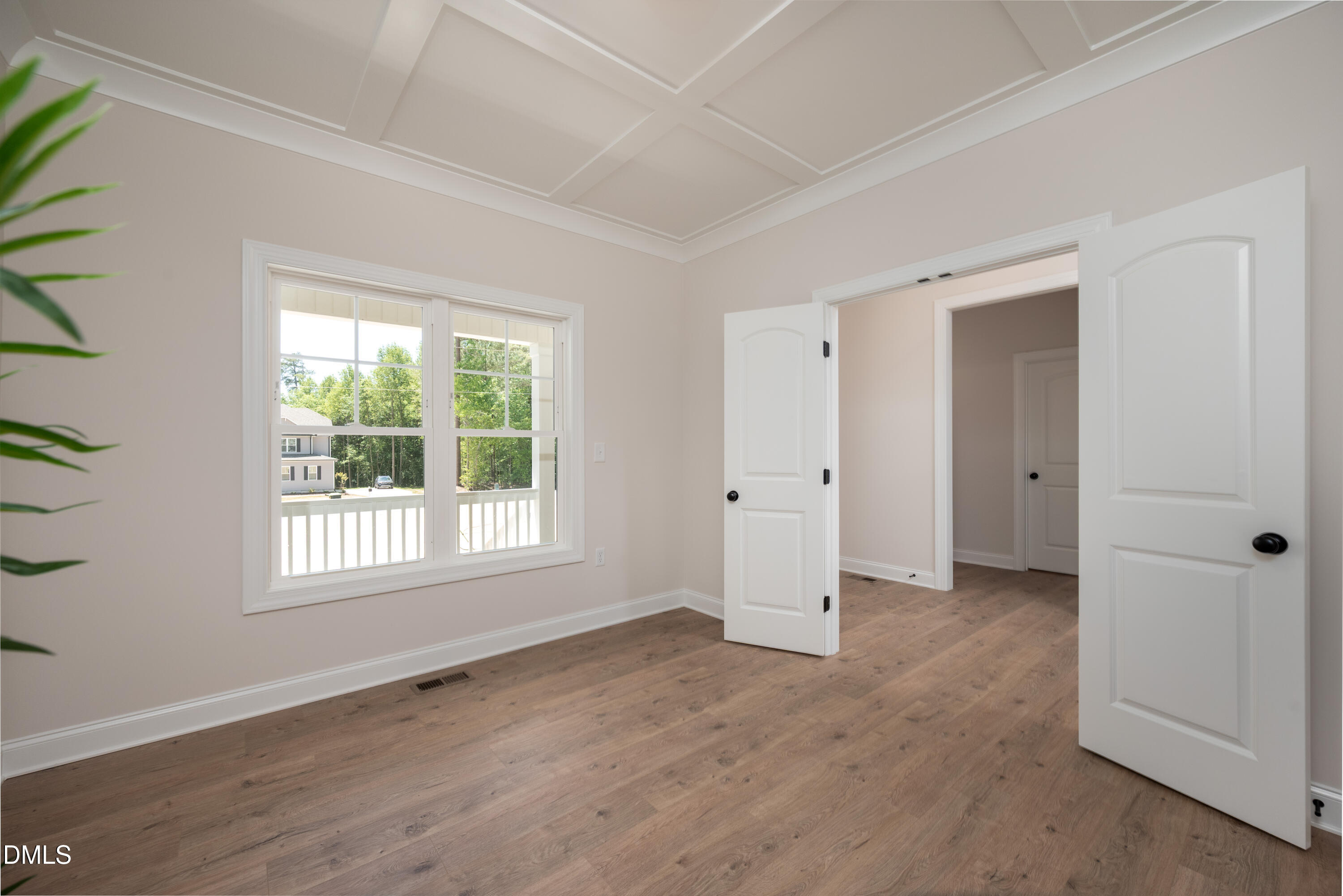 2275 Peachtree Hills Road Spring Hope, NC 27882 - Photo 10 of 43 an empty room with wooden floor and windows