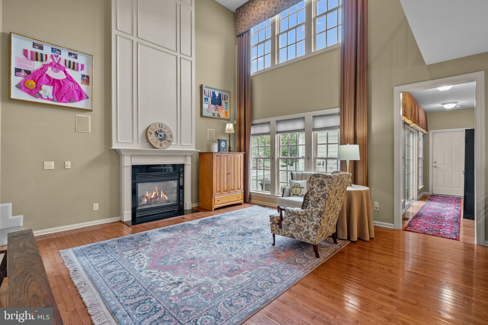 1606 Reading Circle Huntingdon Valley, PA 19006 - Photo 18 of 41 a living room with furniture and a fireplace