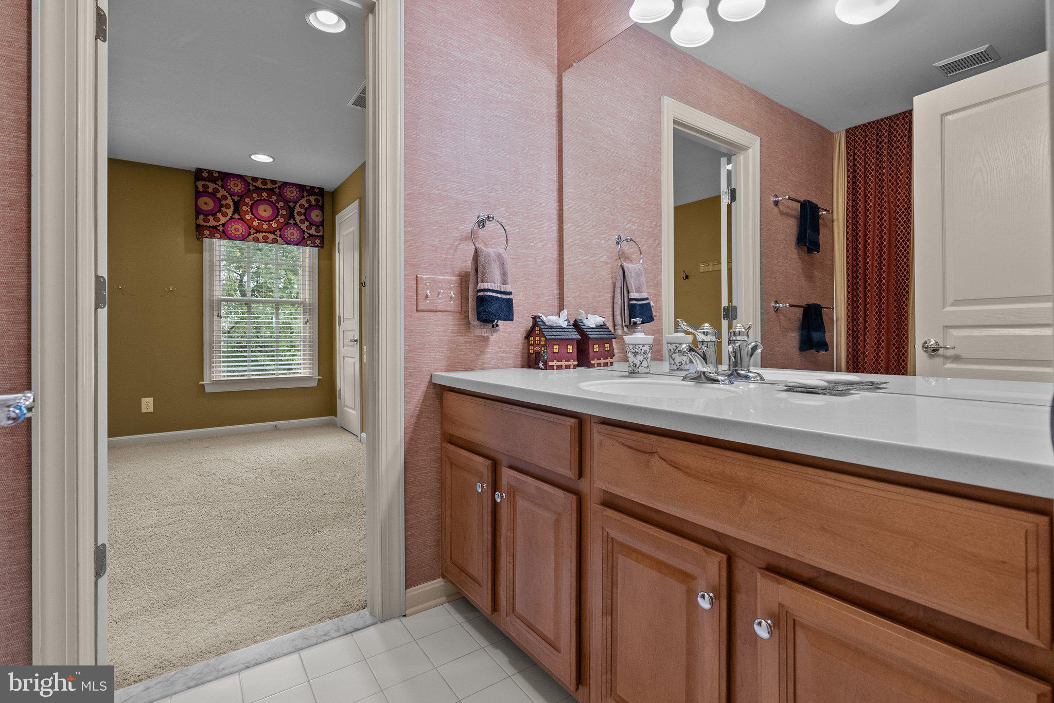1606 Reading Circle Huntingdon Valley, PA 19006 - Photo 24 of 41 a bathroom with a sink and a mirror