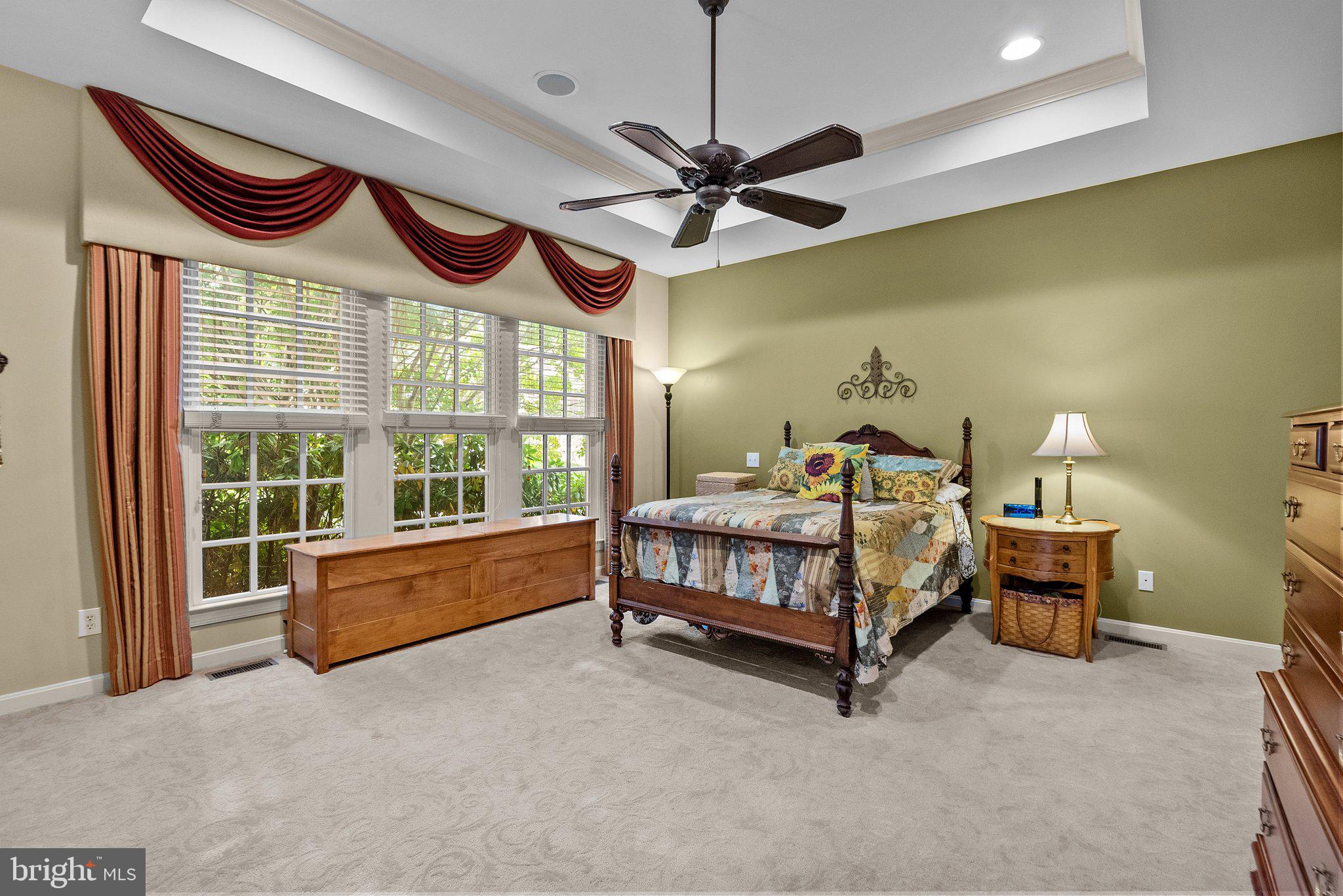 1606 Reading Circle Huntingdon Valley, PA 19006 - Photo 33 of 41 a bed room with a bed and a chandelier