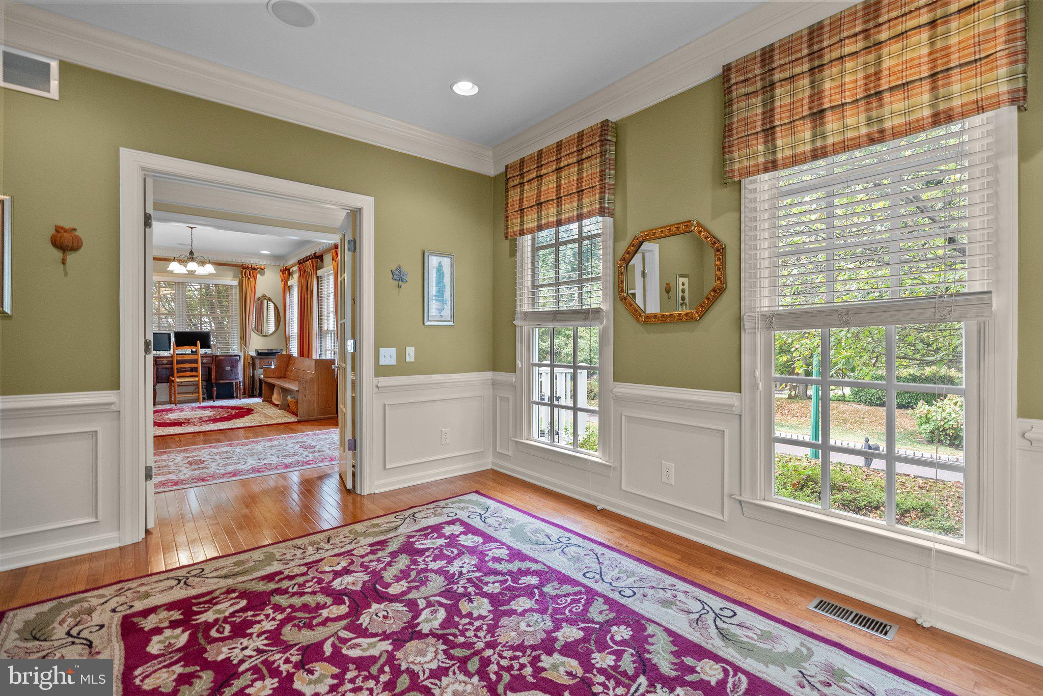 1606 Reading Circle Huntingdon Valley, PA 19006 - Photo 7 of 41 a living room with a rug and a table