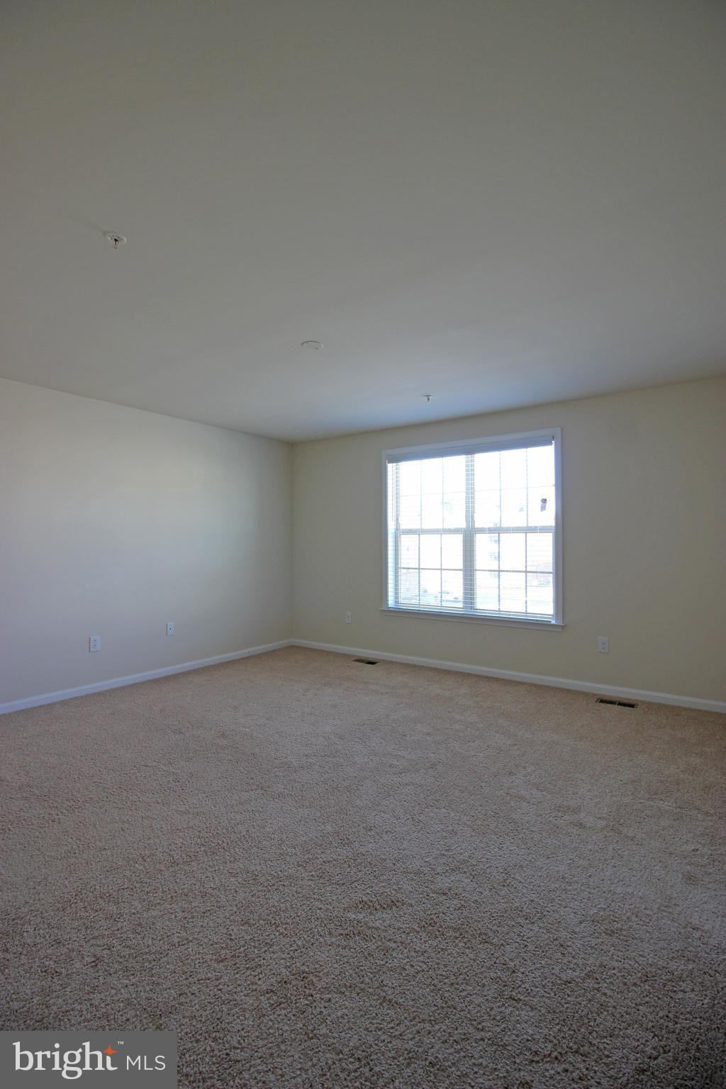4720 Cambria Road Frederick, MD 21703 - Photo 16 of 41 an empty room with a window
