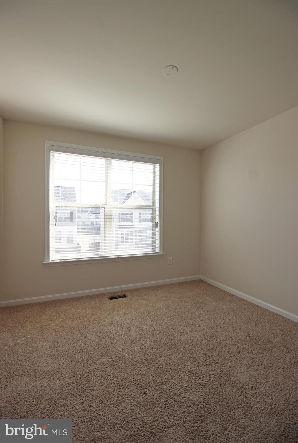 4720 Cambria Road Frederick, MD 21703 - Photo 21 of 41 an empty room with a window
