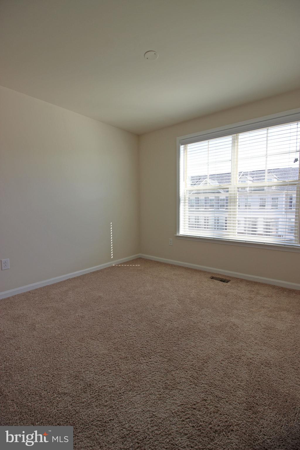 4720 Cambria Road Frederick, MD 21703 - Photo 26 of 41 an empty room with a window