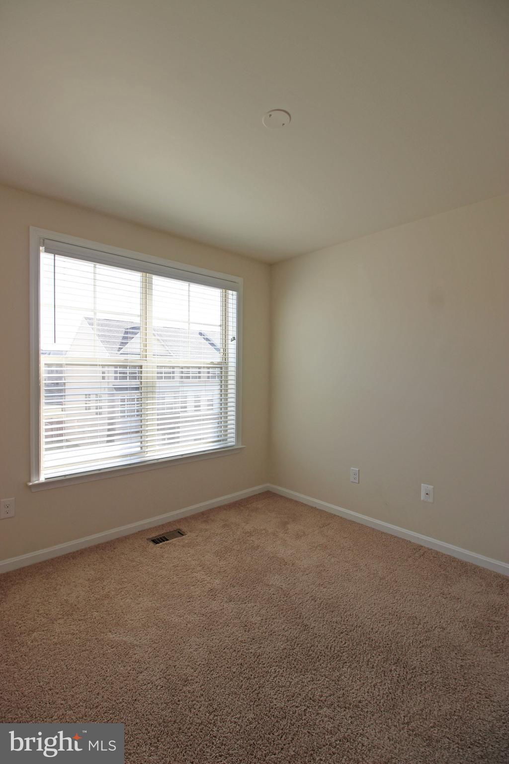 4720 Cambria Road Frederick, MD 21703 - Photo 27 of 41 an empty room with a window