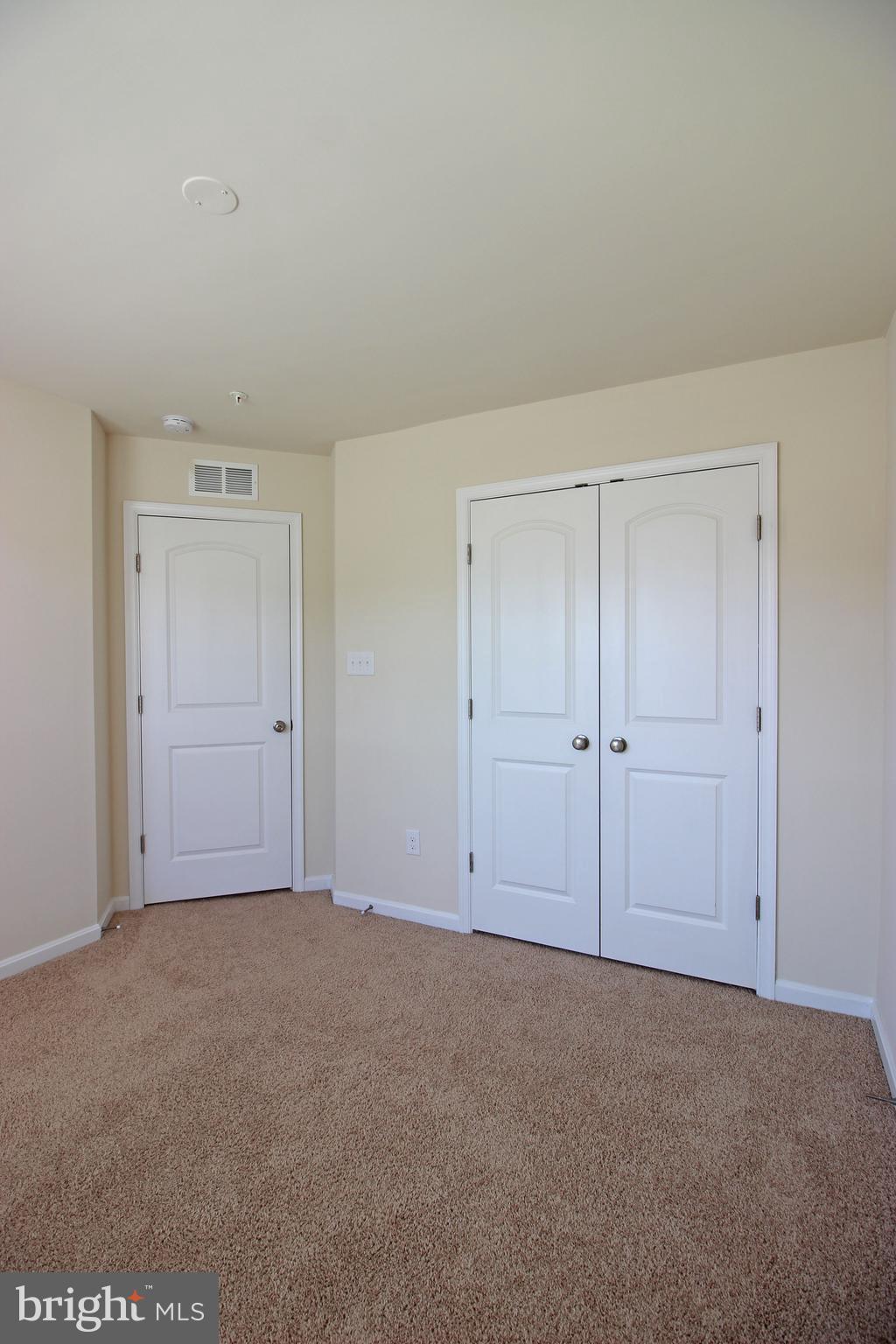 4720 Cambria Road Frederick, MD 21703 - Photo 28 of 41 a view of an empty room and closet area