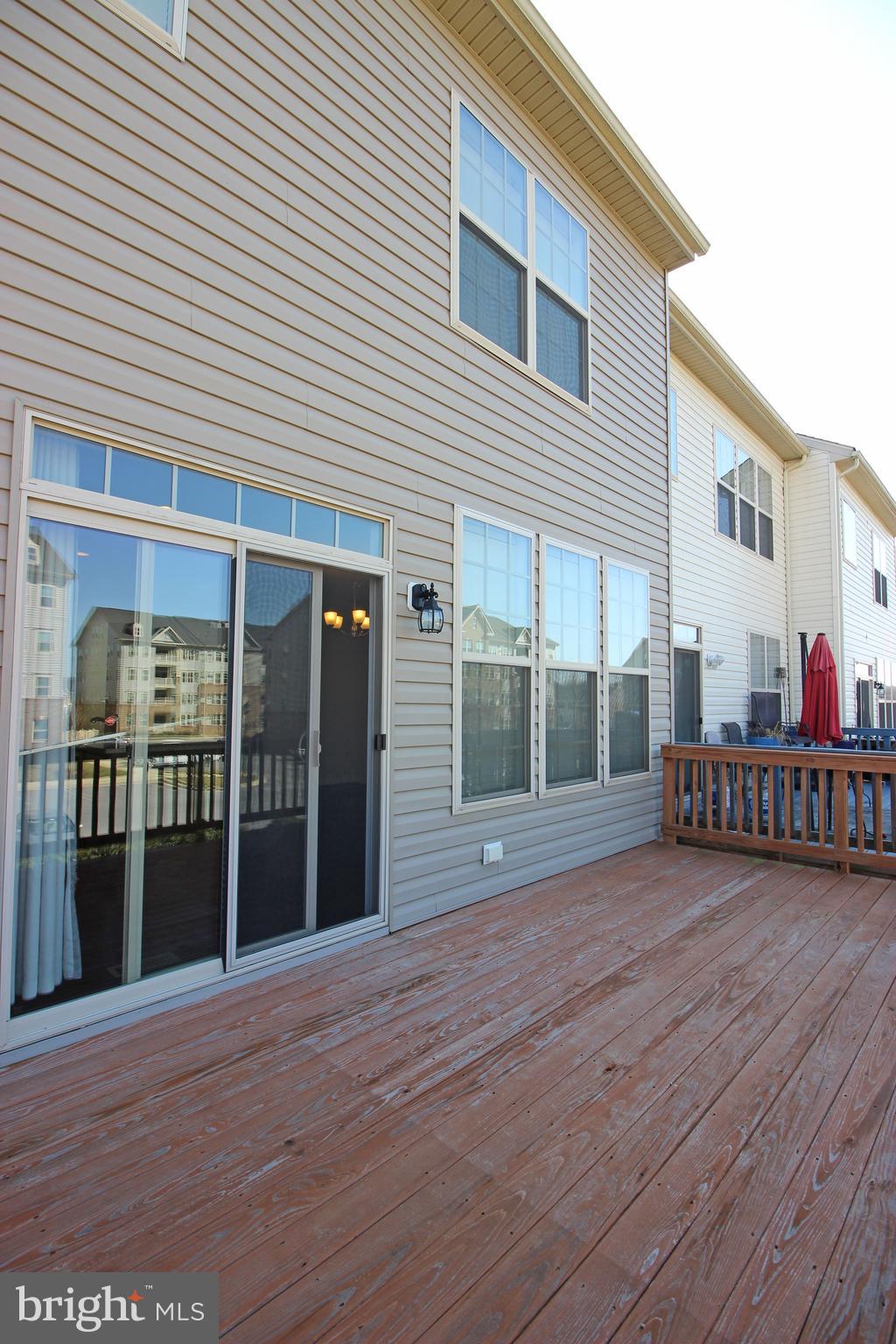 4720 Cambria Road Frederick, MD 21703 - Photo 39 of 41 a view of a house with wooden deck