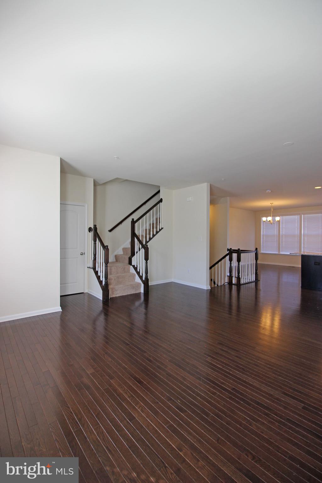 4720 Cambria Road Frederick, MD 21703 - Photo 4 of 41 a view of a room with wooden floor