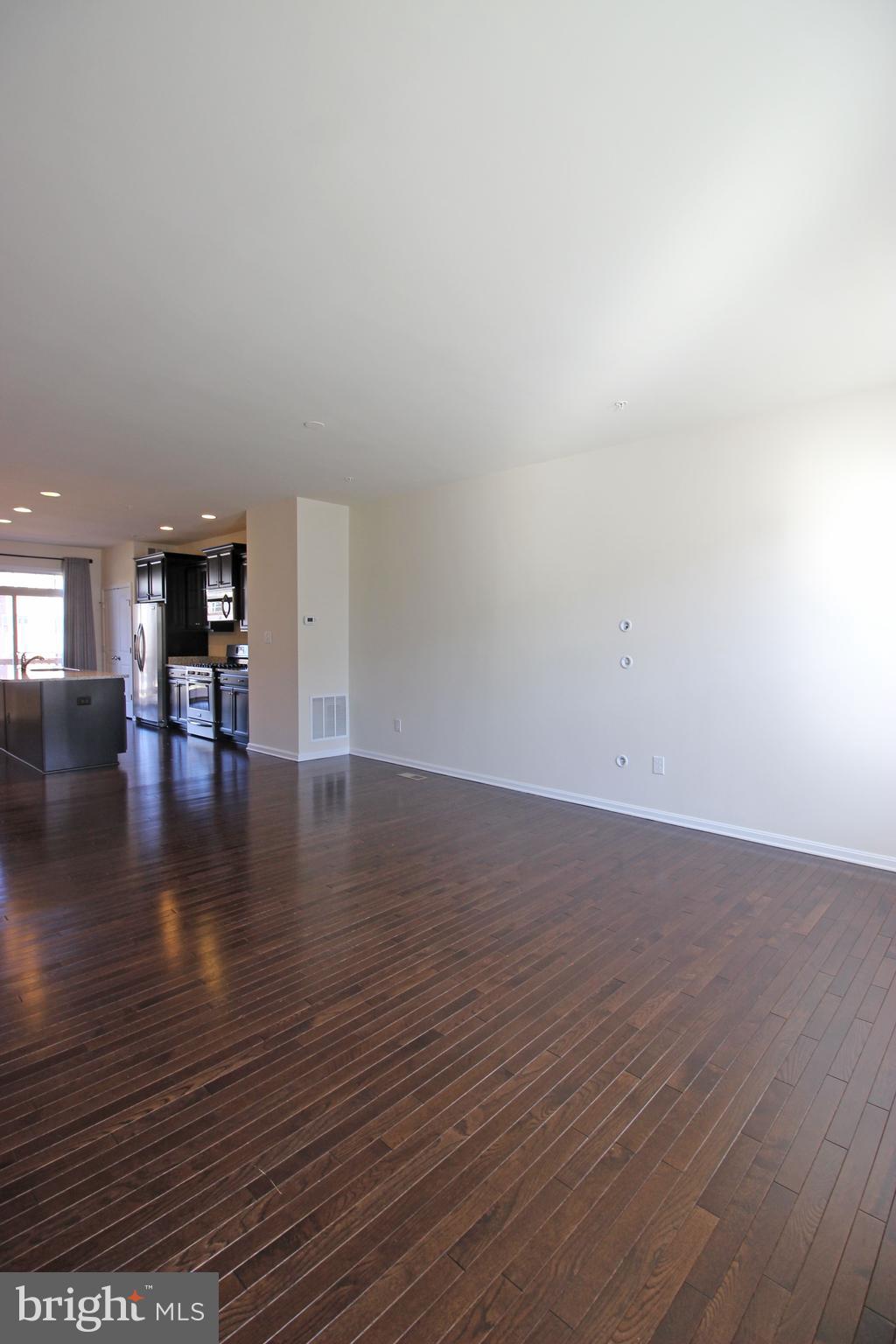 4720 Cambria Road Frederick, MD 21703 - Photo 5 of 41 a view of a livingroom with furniture and wooden floor