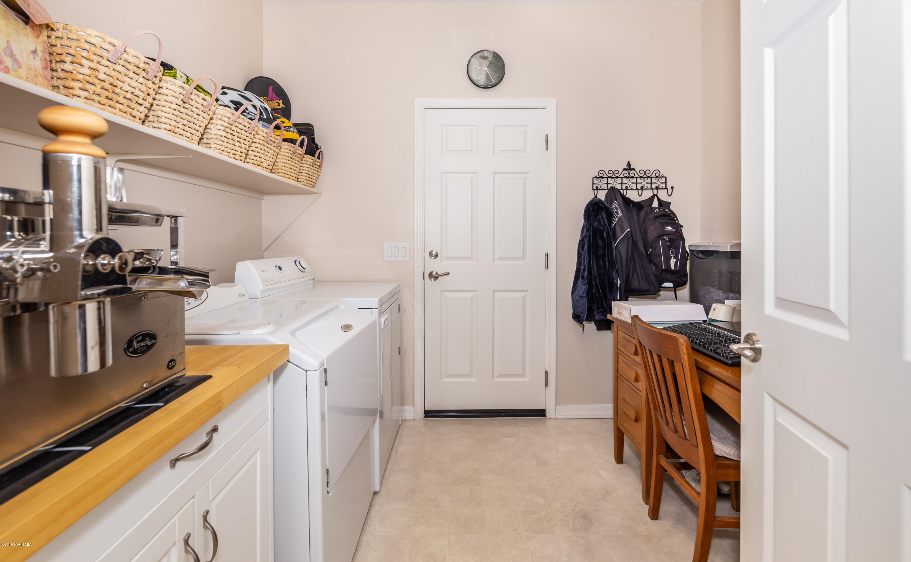7258 Woolsey Ranch Road Prescott Valley, AZ 86314 - Photo 7 of 28 a view of a storage & utility room with a sink
