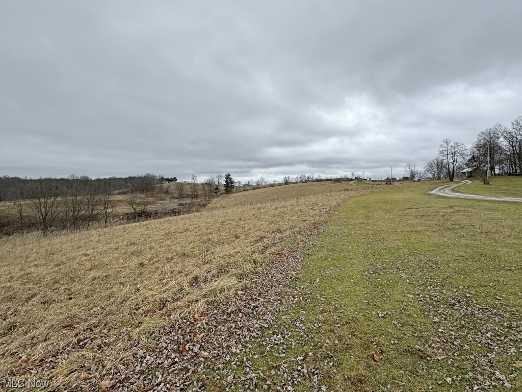 1357 Sand Ridge Road Zanesville, OH 43701 - Photo 18 of 50 View of yard featuring a rural view