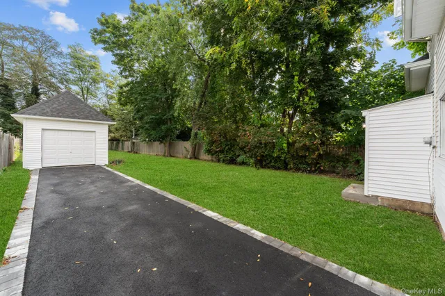 a view of a backyard with a garden