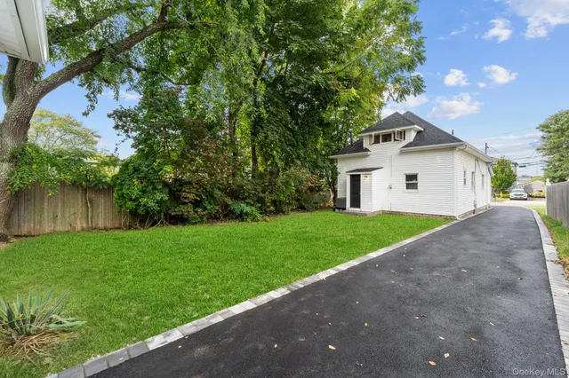 a view of a backyard with a small cabin