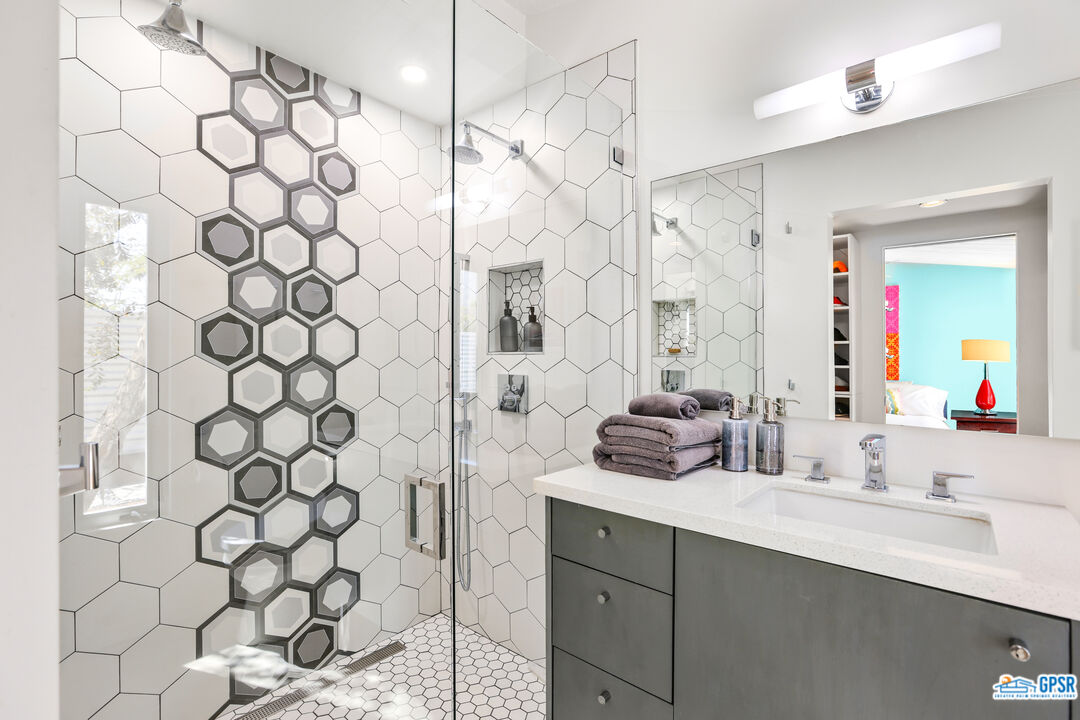 2108 George Drive Palm Springs, CA 92262 - Photo 11 of 33 a bathroom with a double vanity sink mirror and double