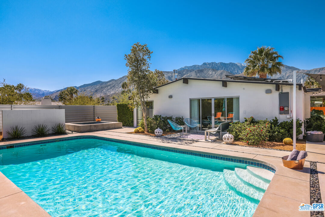 2108 George Drive Palm Springs, CA 92262 - Photo 24 of 33 a view of a house with backyard porch and sitting area