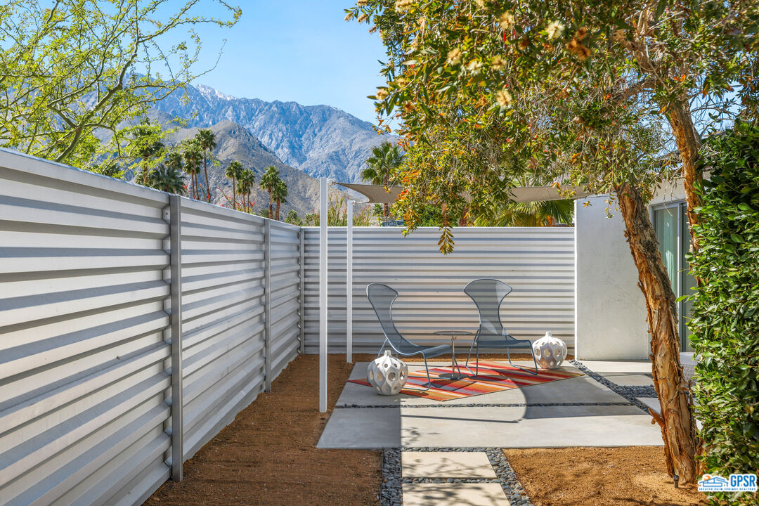 2108 George Drive Palm Springs, CA 92262 - Photo 28 of 33 a backyard of a house with seating space