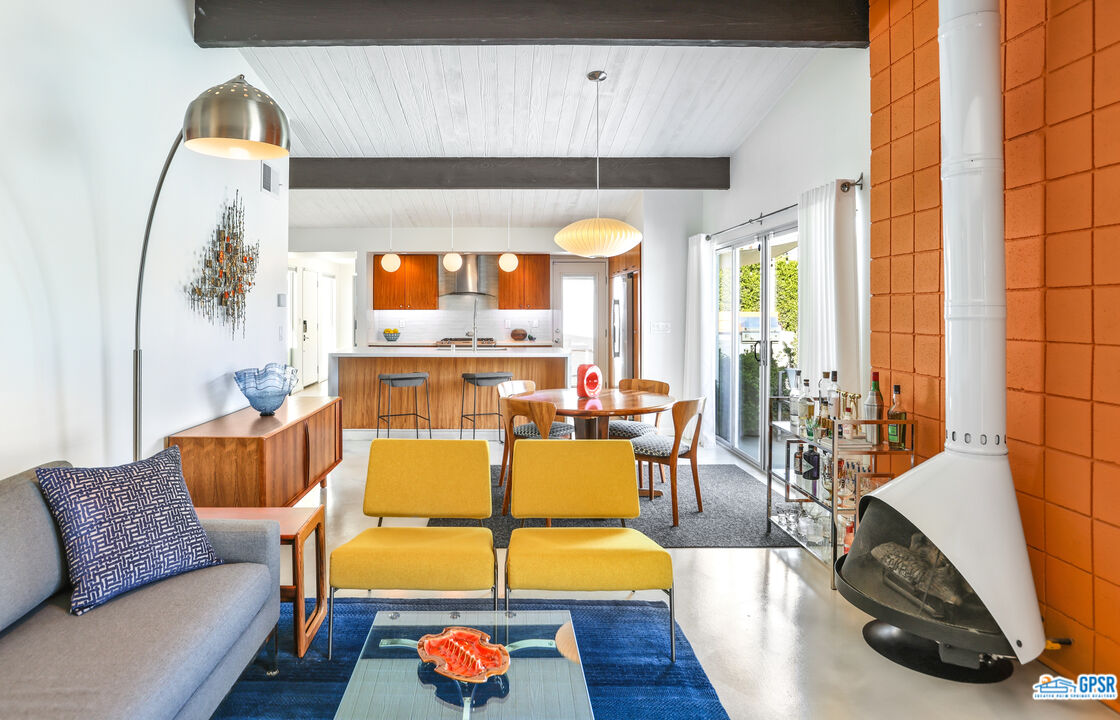 2108 George Drive Palm Springs, CA 92262 - Photo 9 of 33 a living room with a couch and a table