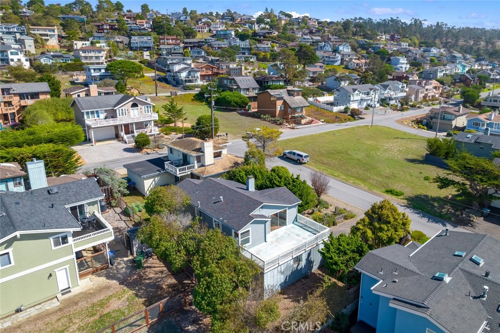 379 Harvey Street Cambria, CA 93428 - Photo 49 of 52 an aerial view of residential houses with outdoor space