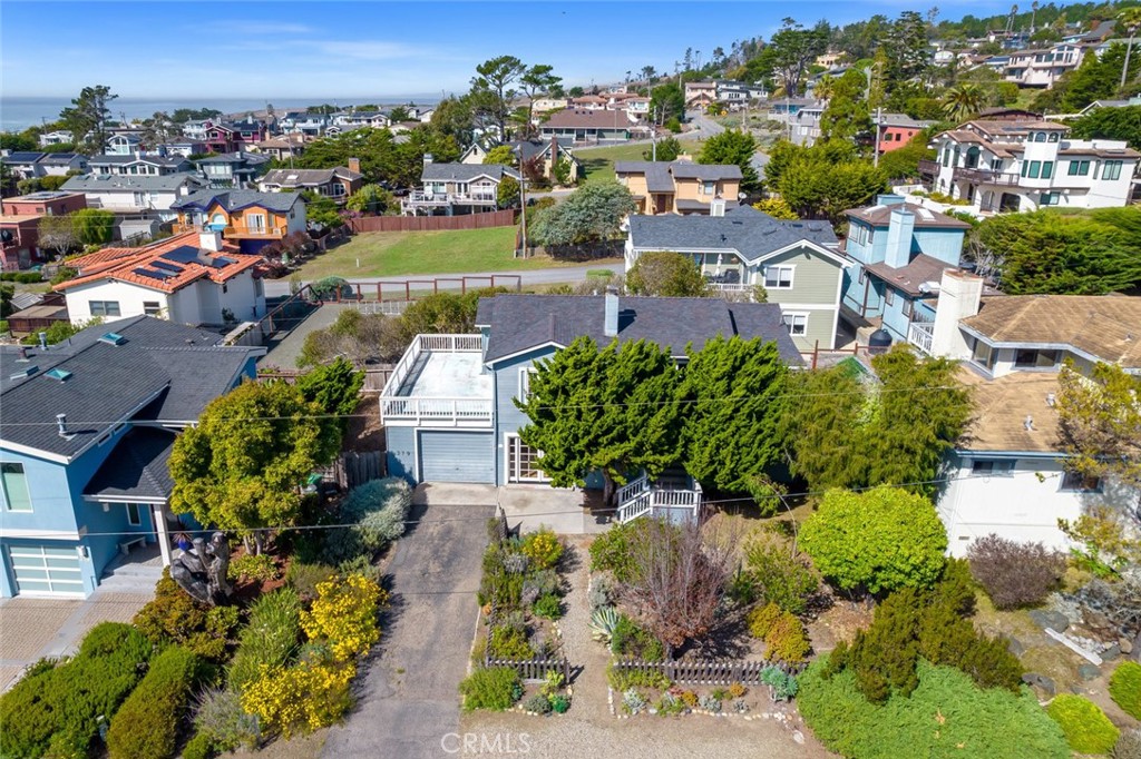 379 Harvey Street Cambria, CA 93428 - Photo 51 of 52 an aerial view of a city with lots of residential buildings