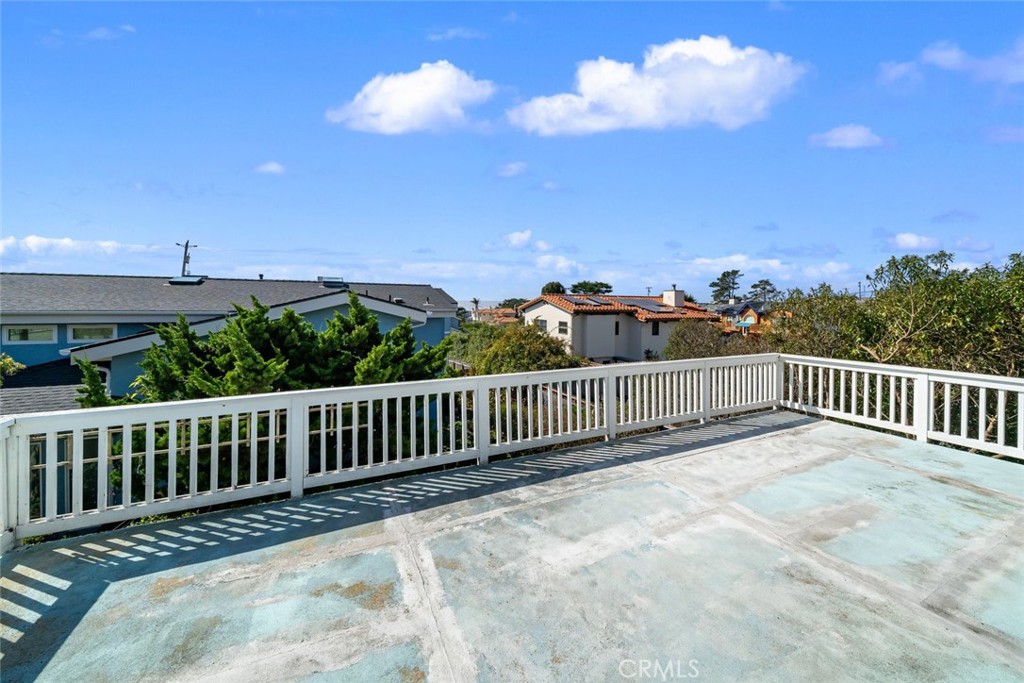 379 Harvey Street Cambria, CA 93428 - Photo 6 of 52 a view of balcony with wooden fence