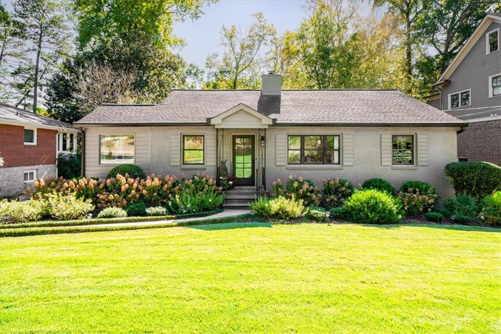 228 Westchester Drive Decatur, GA 30030 - Photo 1 of 1 a front view of a house with a yard