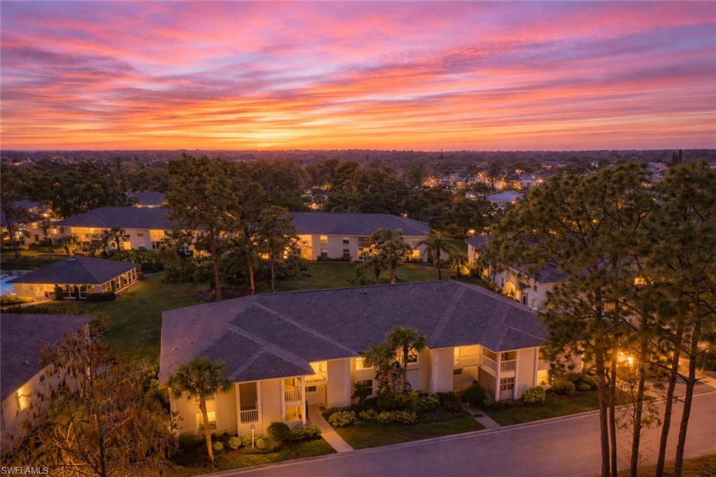 776 Landover Circle, Unit 104 Naples, FL 34104 - Photo 1 of 25 a view of a city with ocean view