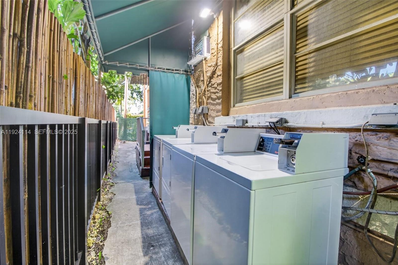 3409 South Le Jeune Road, Unit 4 Coral Gables, FL 33134 - Photo 4 of 5 a utility room with dryer and washer